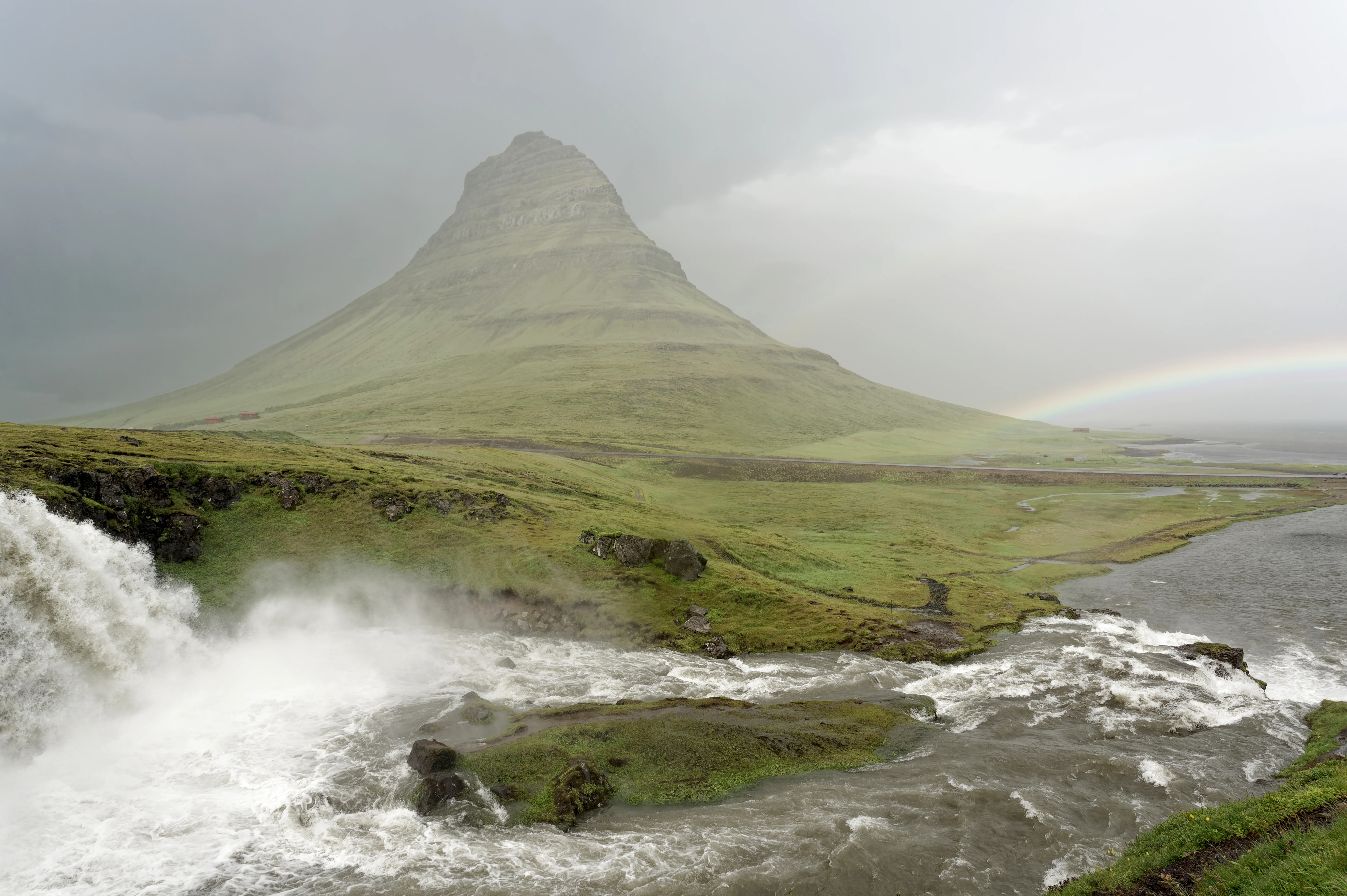 Kirkjufell mountain and the Kirkjufellsfoss waterfall on Iceland's Snæfellsnes Peninsula, one of the regions inside the August 12, 2026 path of totality
