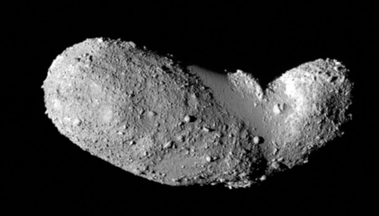 The peanut-shaped rubble-pile asteroid Itokawa, a small S-type near-Earth asteroid imaged up close by Japan's Hayabusa spacecraft — shown here as a stand-in, since no freely licensed close-up of Kamoʻoalewa exists yet.